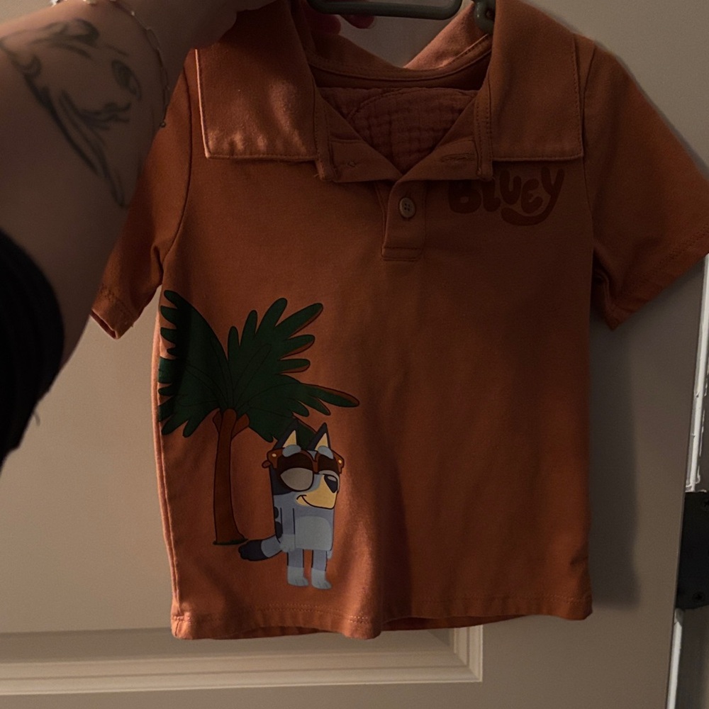 Target Kids' Orange Polo with Character Design